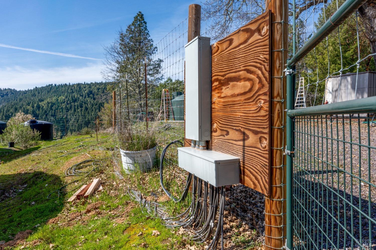 20401 Tomki Road Redwood Valley, CA 95470 - Photo 25 of 35 a view of a chairs and table in the patio