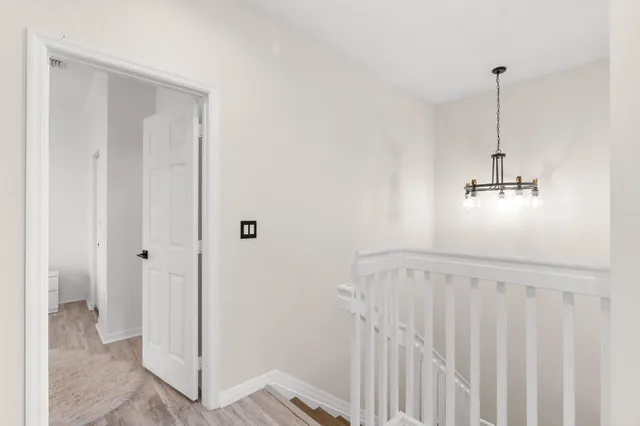 a view of a hallway with closet area
