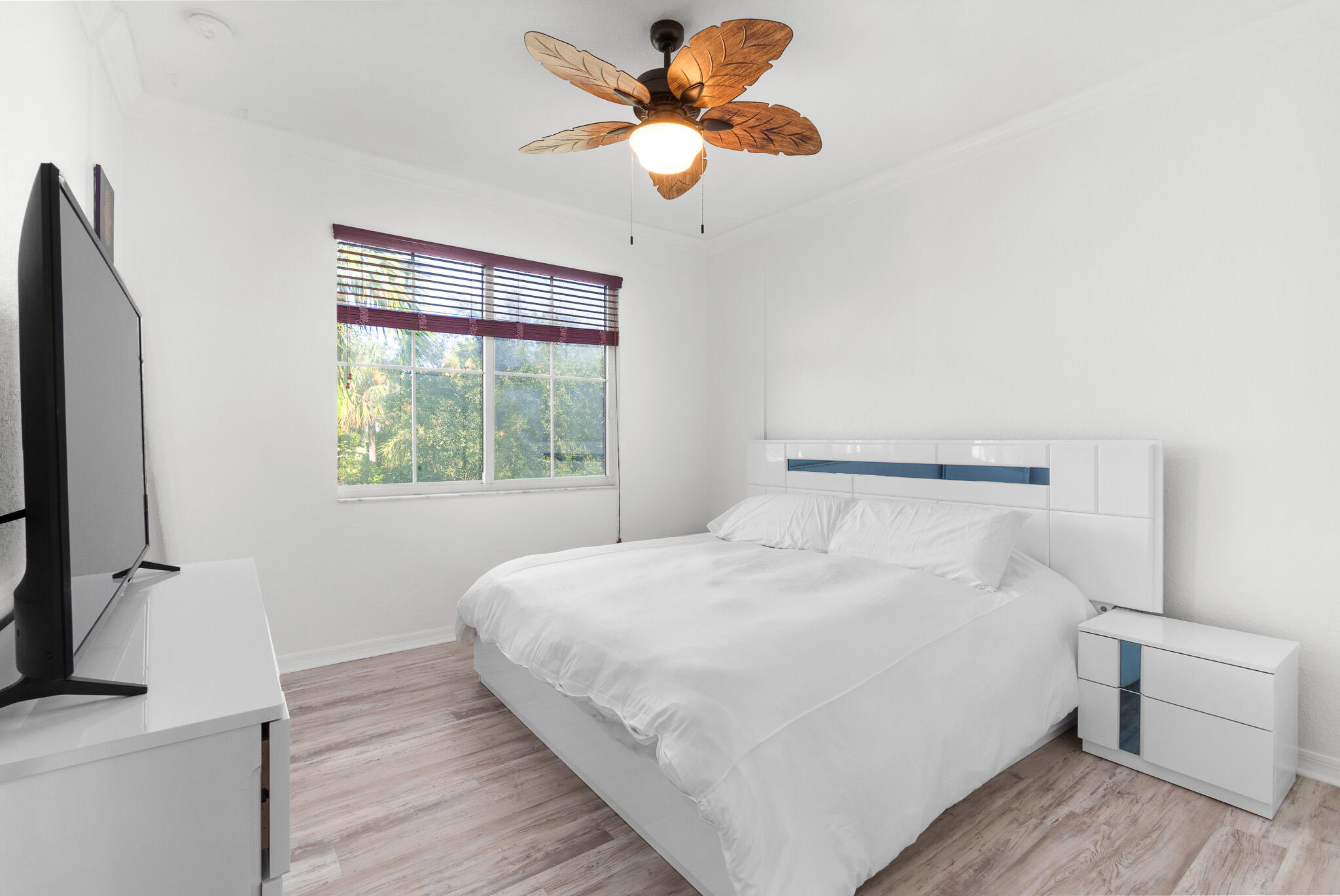 155 Monterey Bay Drive Boynton Beach, FL 33426 - Photo 18 of 37 a bedroom with a bed and a window