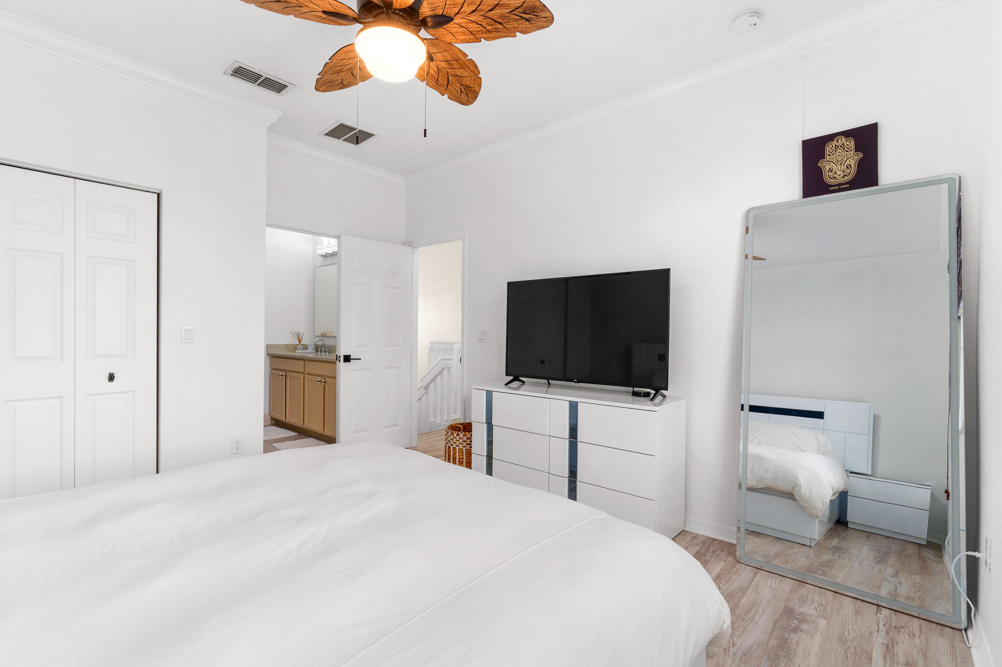 155 Monterey Bay Drive Boynton Beach, FL 33426 - Photo 19 of 37 a bedroom with a bed and a flat screen tv