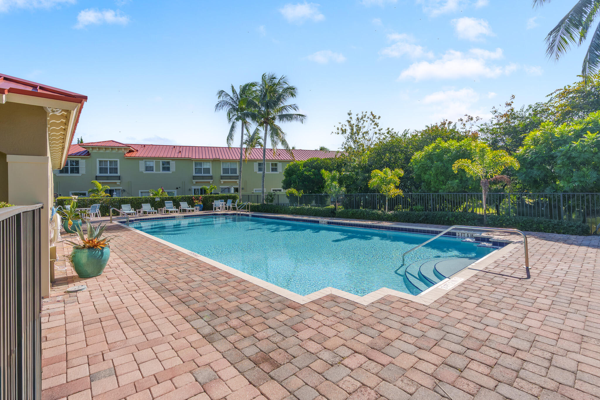 155 Monterey Bay Drive Boynton Beach, FL 33426 - Photo 32 of 37 a view of swimming pool with a patio