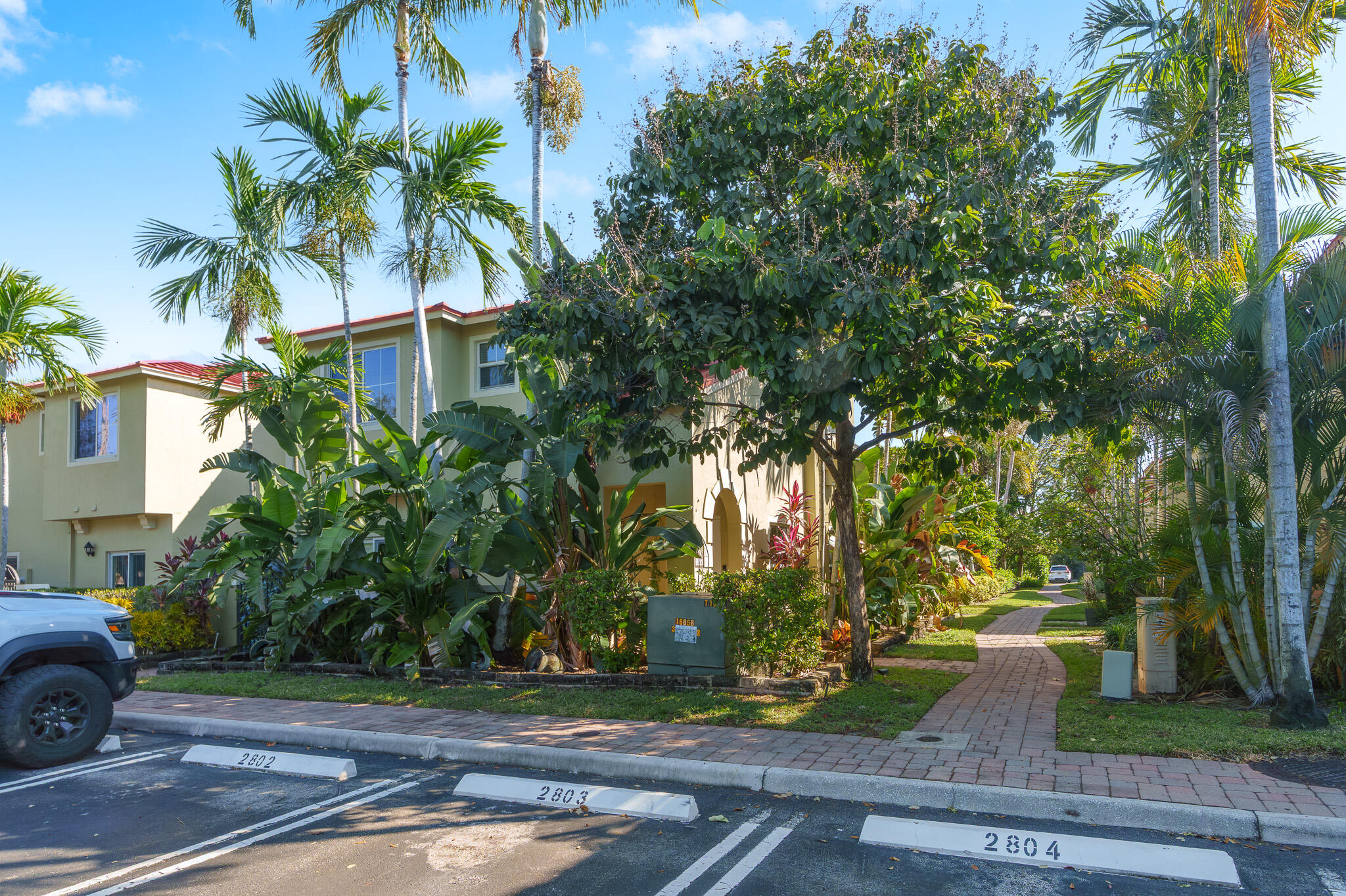 155 Monterey Bay Drive Boynton Beach, FL 33426 - Photo 37 of 37 a front view of a house with garden