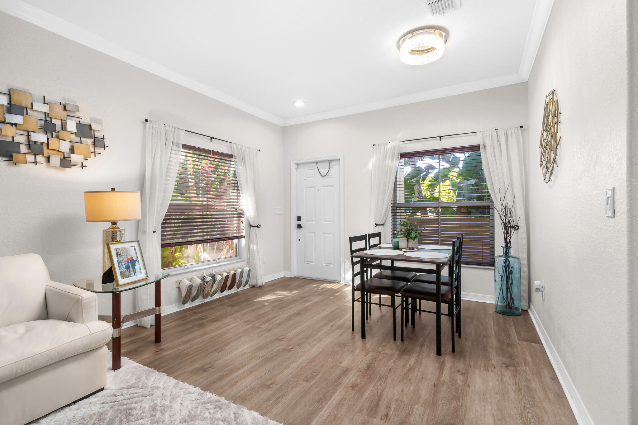 155 Monterey Bay Drive Boynton Beach, FL 33426 - Photo 4 of 37 a work room with furniture and wooden floor