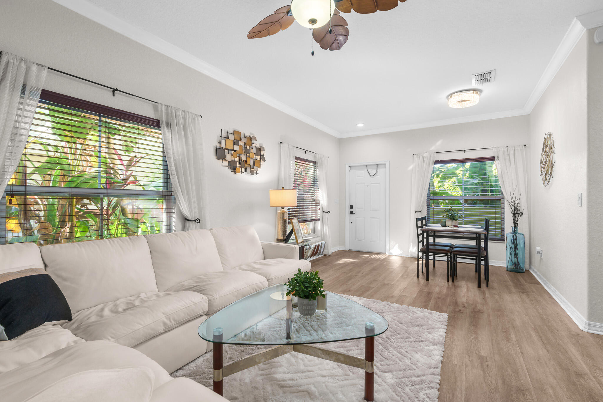 155 Monterey Bay Drive Boynton Beach, FL 33426 - Photo 5 of 37 a living room with furniture and wooden floor
