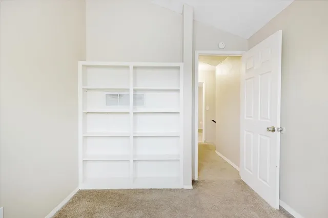 a view of a room with shelves