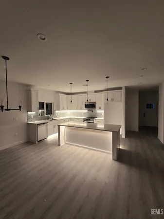 a bathroom with a bathtub a toilet and a shower