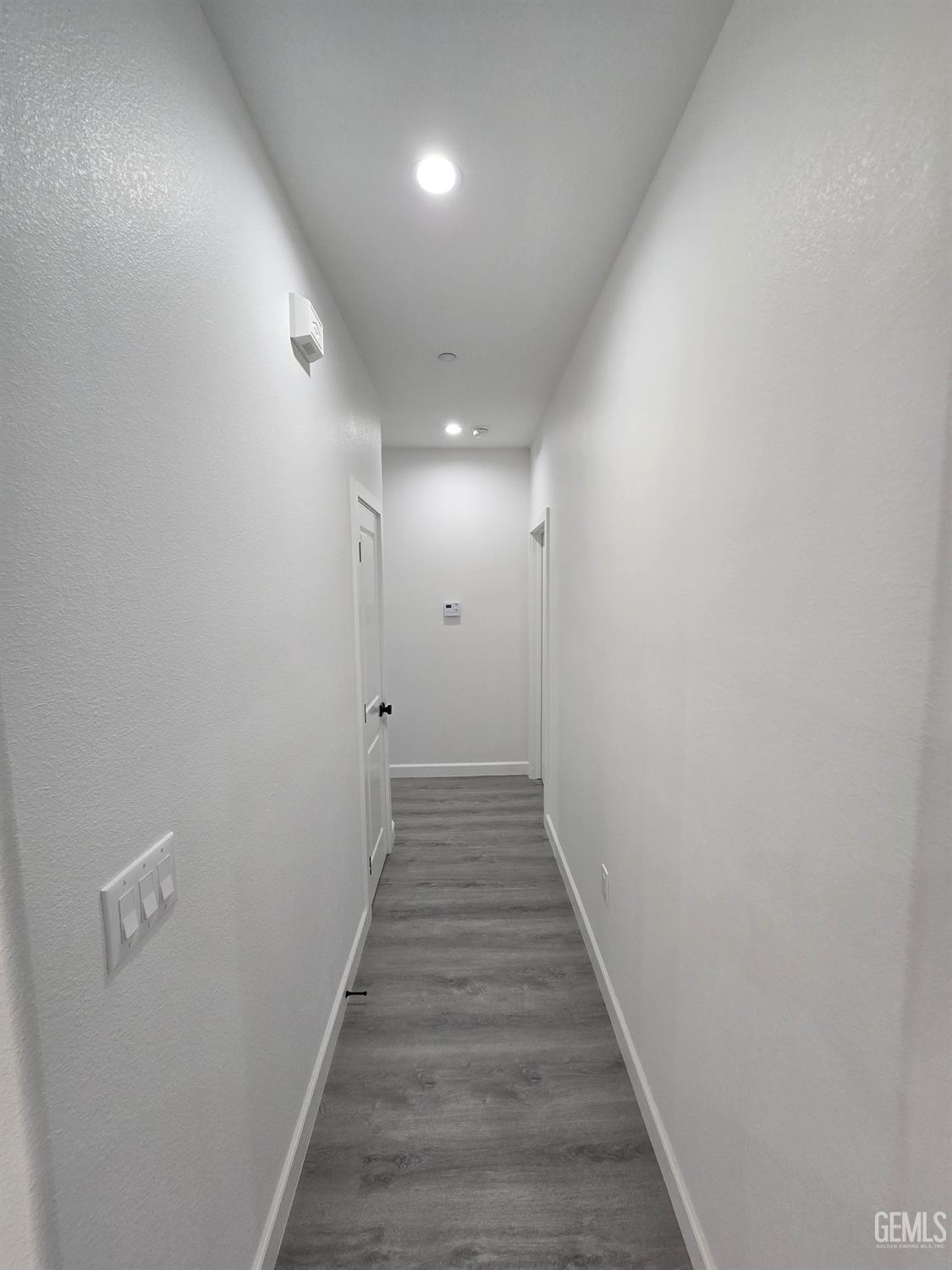 Undisclosed Address California City, CA 93505 - Photo 28 of 41 a view of a hallway with wooden floor