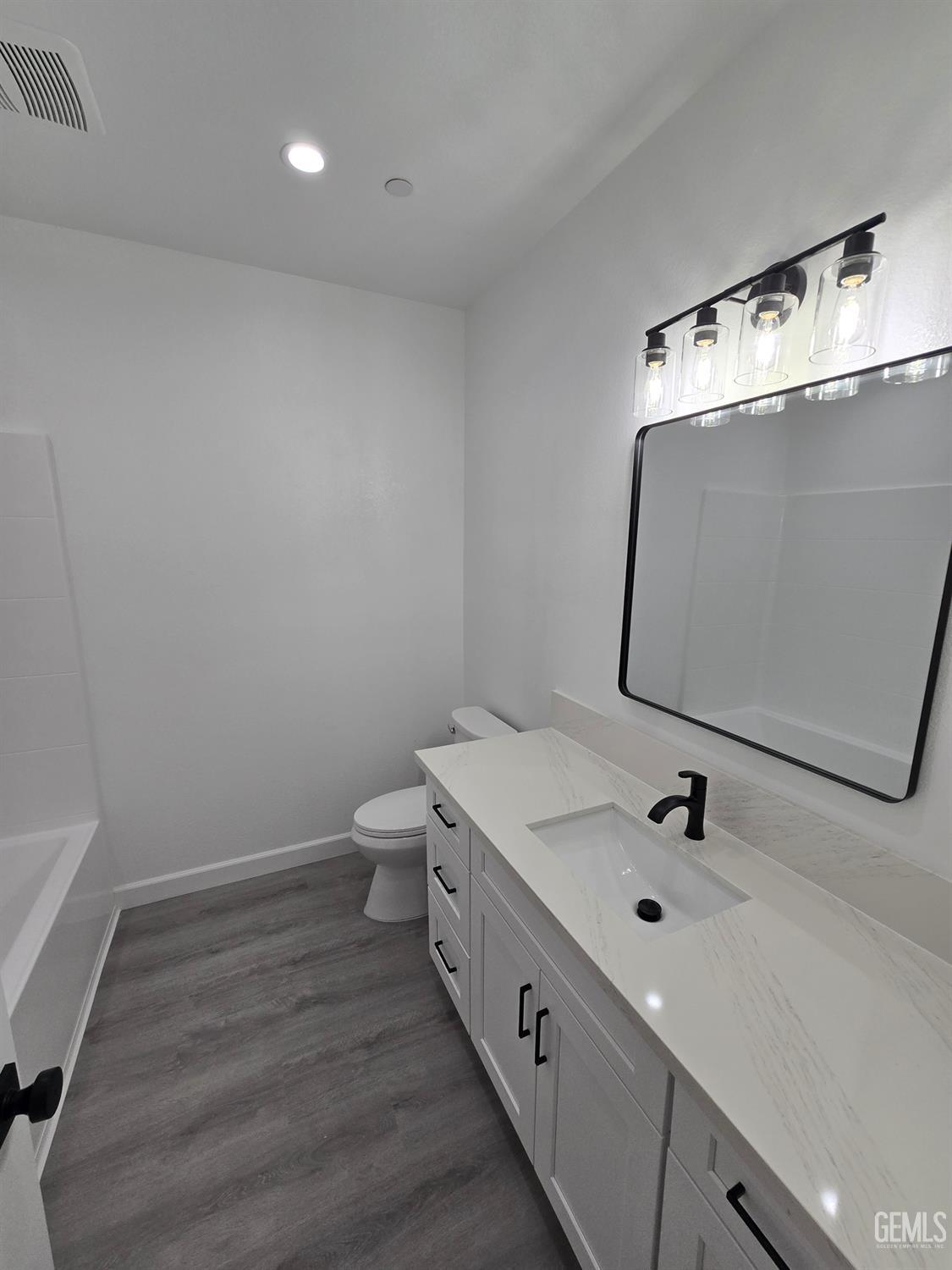 Undisclosed Address California City, CA 93505 - Photo 31 of 41 a bathroom with a sink and mirror