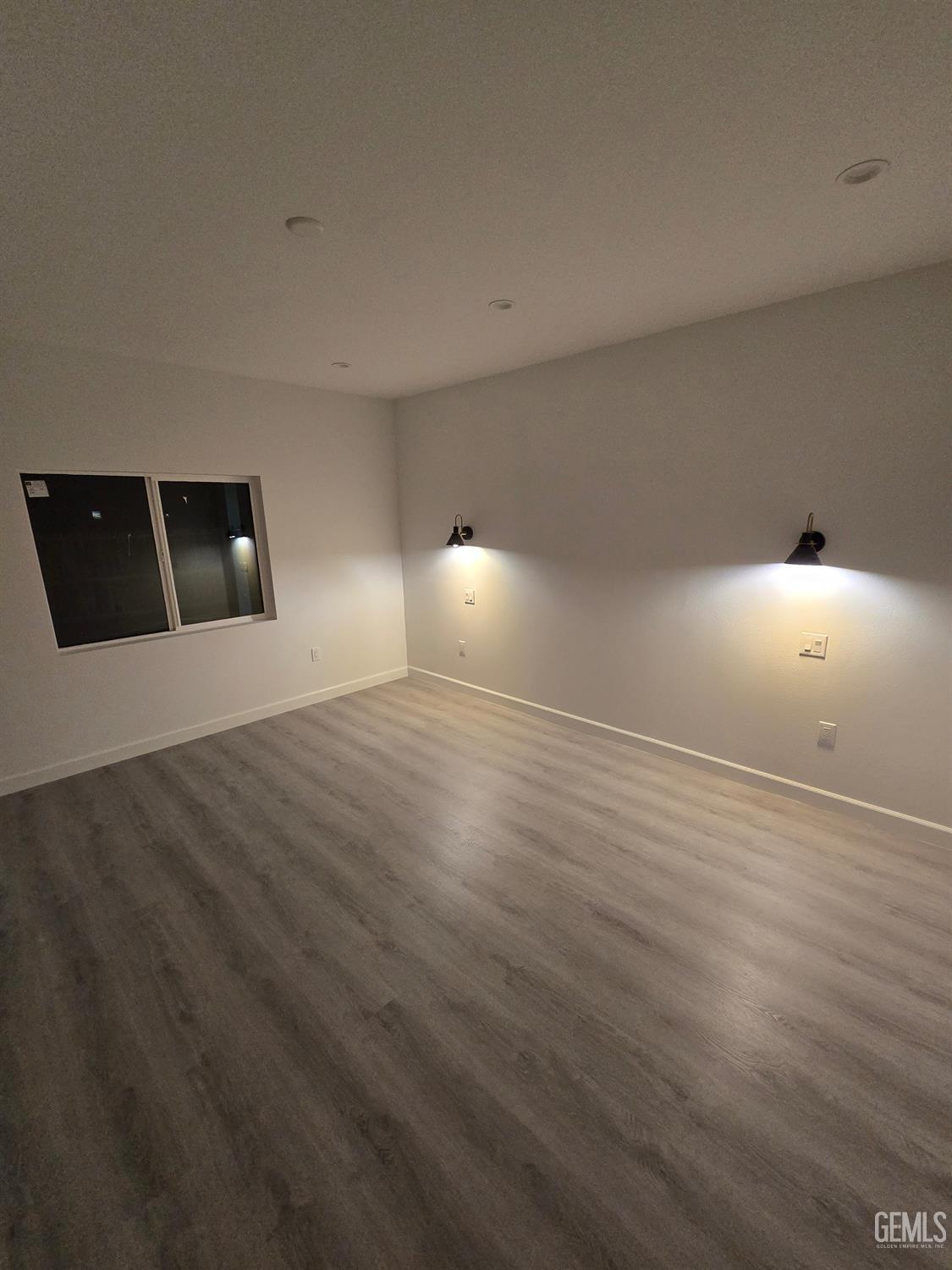 Undisclosed Address California City, CA 93505 - Photo 37 of 41 a view of an empty room with wooden floor