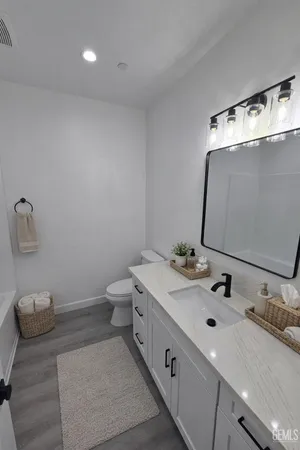 a view of a backyard of the house