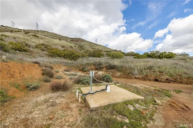 a view of a yard with an ocean