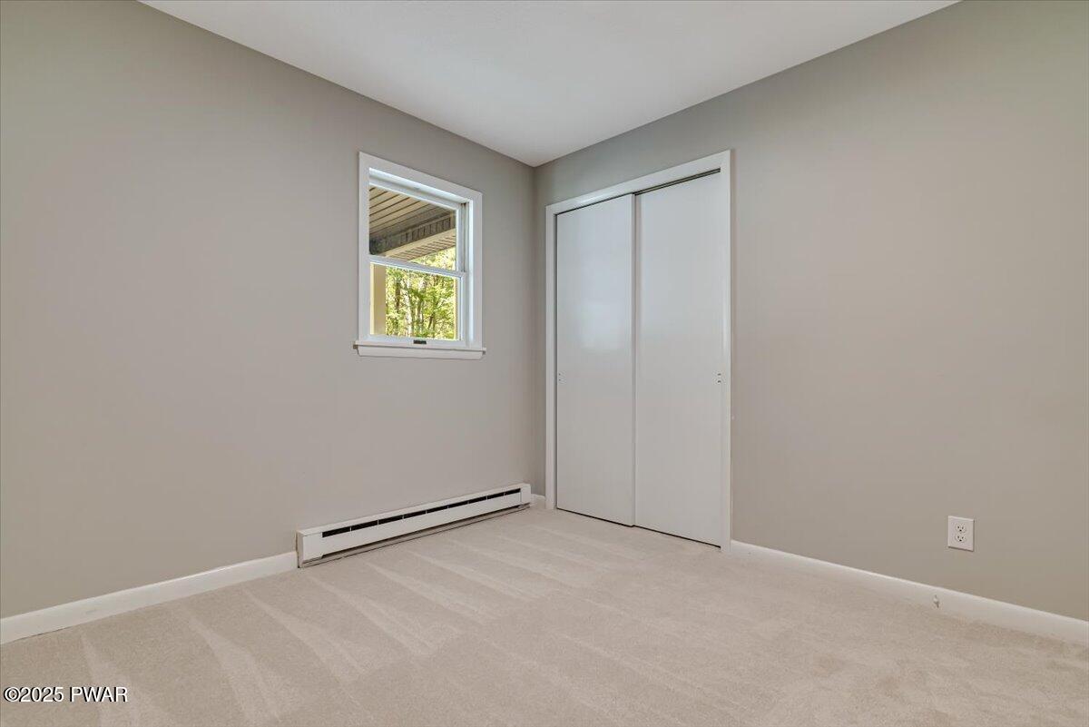 107 Kiel Road Milford, PA 18337 - Photo 27 of 71 an empty room with windows