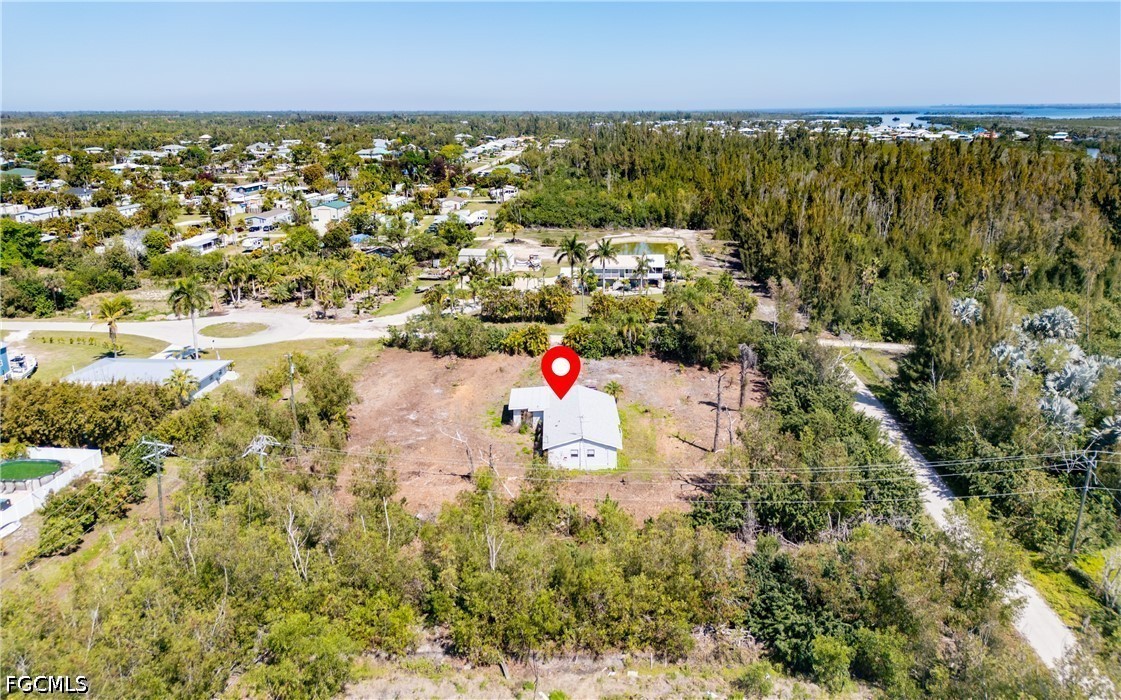 5427 Easy Street Bokeelia, FL 33922 - Photo 1 of 9 a aerial view of beach and city
