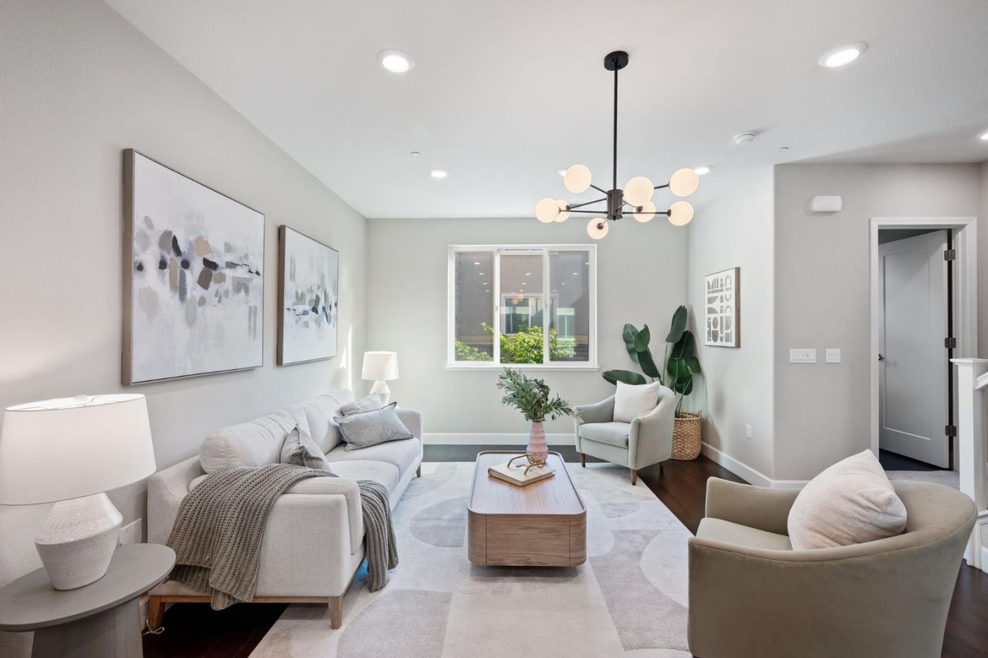 5977 Larkstone Loop San Jose, CA 95123 - Photo 10 of 63 a living room with furniture and a chandelier