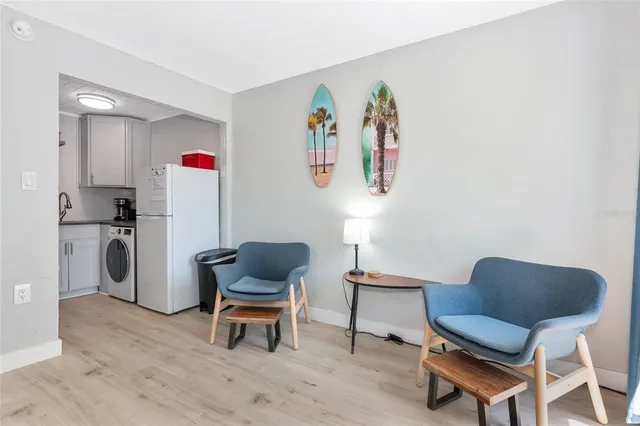 a kitchen with stainless steel appliances granite countertop a sink and a stove