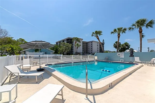 a view of a house with swimming pool