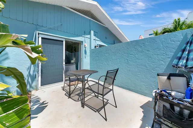 front view of a house with a bench