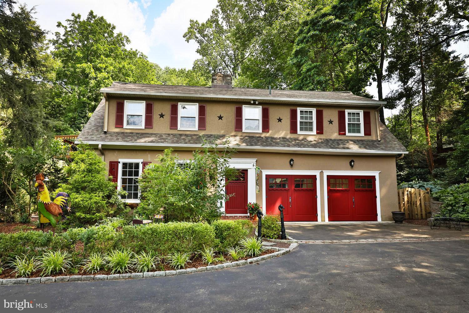 923 Rydal Road Jenkintown, PA 19046 - Photo 1 of 56 a front view of a house with garden