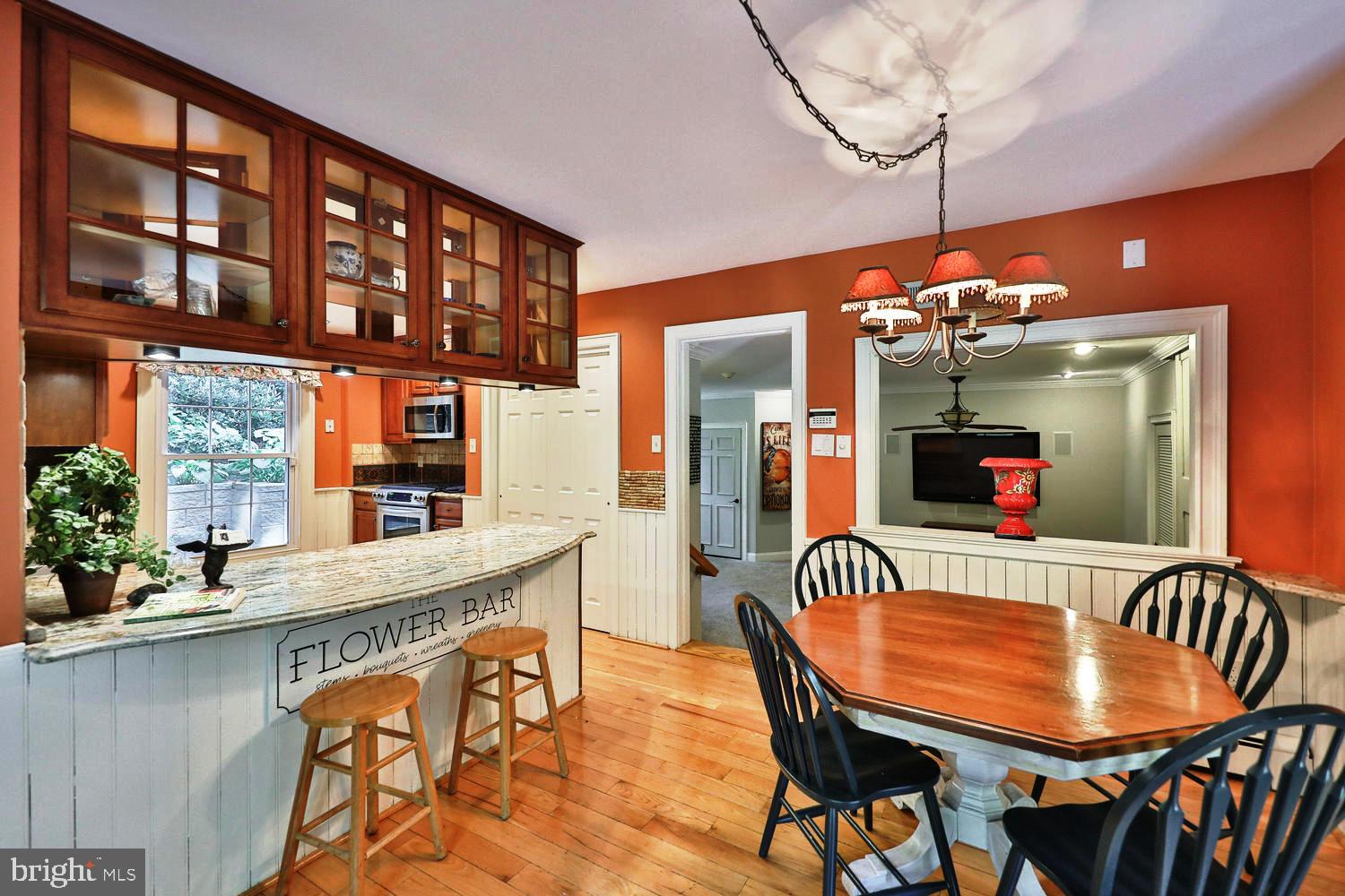 923 Rydal Road Jenkintown, PA 19046 - Photo 12 of 56 a dining room with furniture a chandelier and window