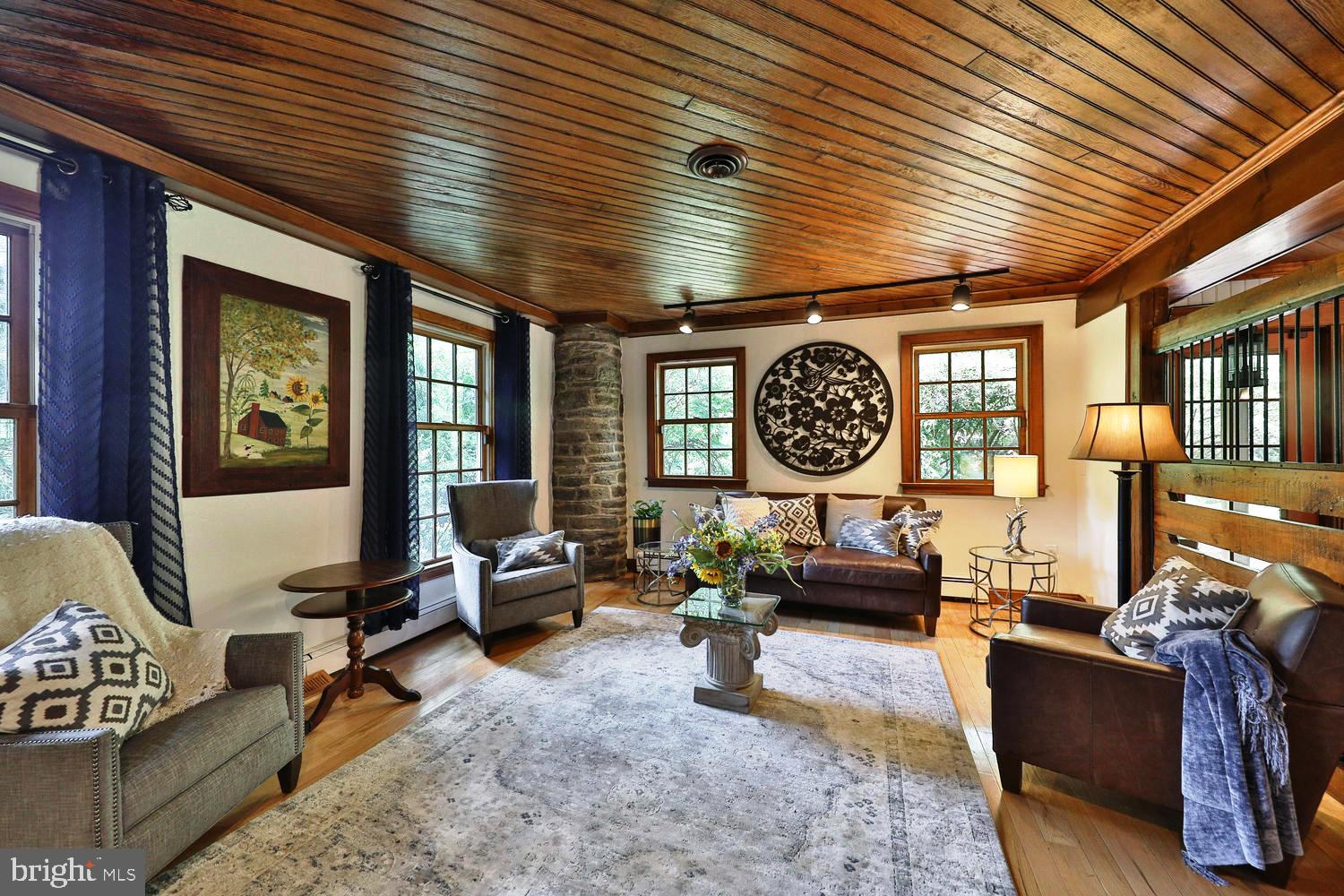 923 Rydal Road Jenkintown, PA 19046 - Photo 3 of 56 a living room with furniture and a large window