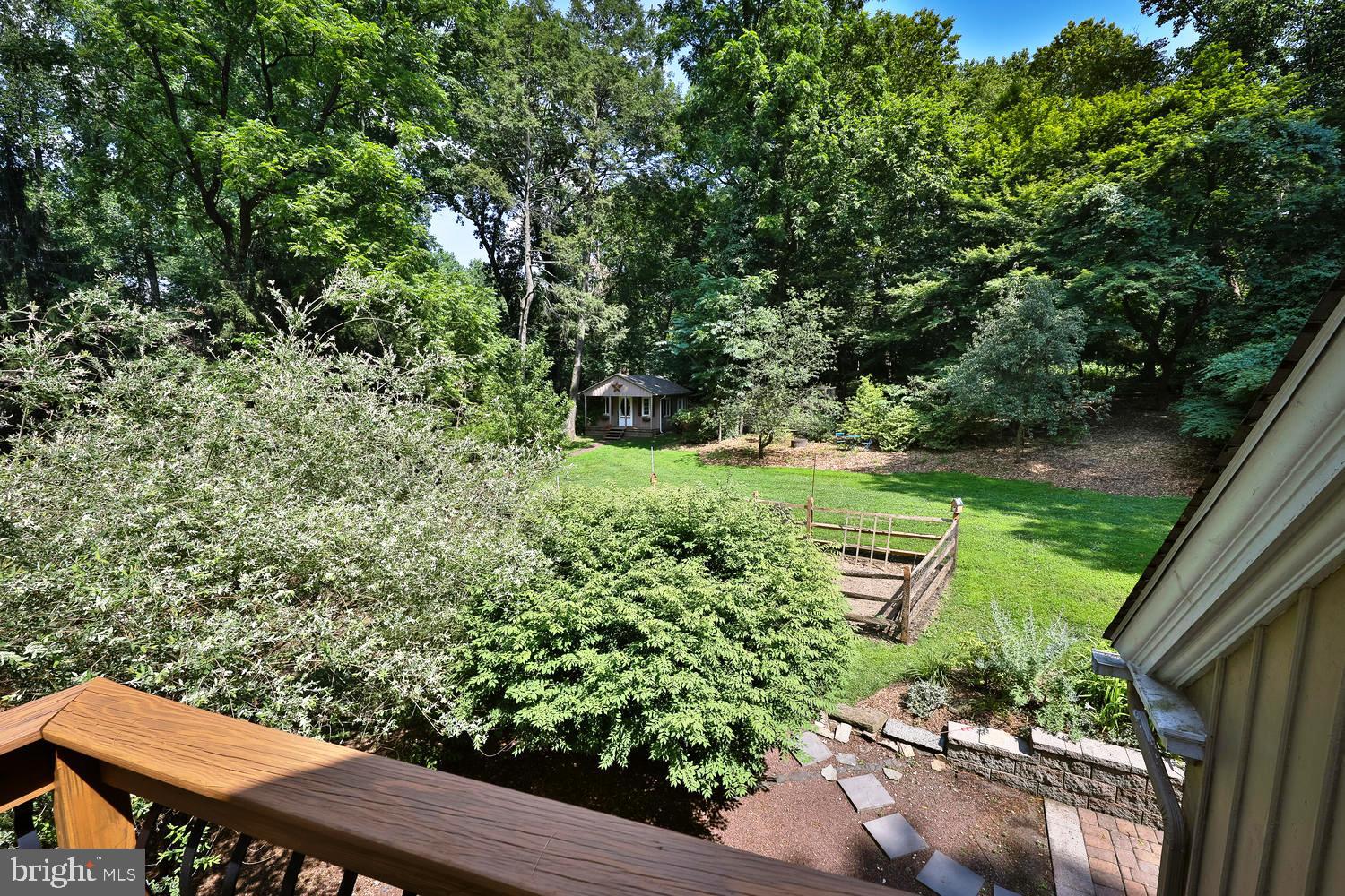 923 Rydal Road Jenkintown, PA 19046 - Photo 36 of 56 a view of a wooden chairs in backyard of a house