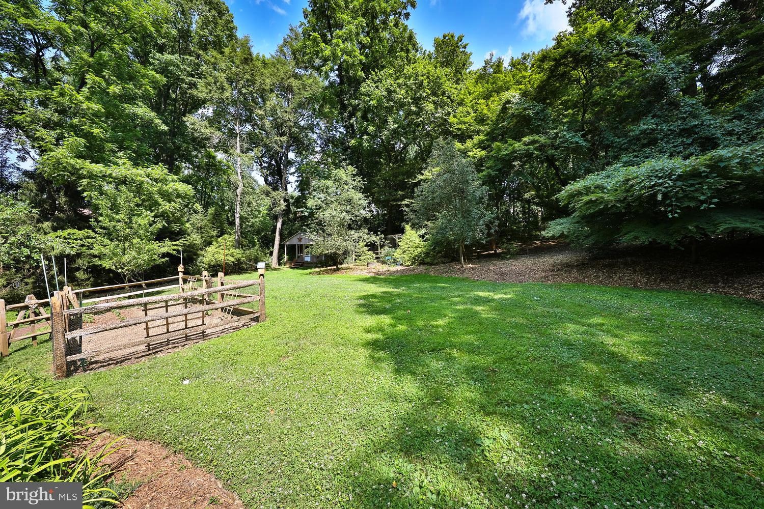 923 Rydal Road Jenkintown, PA 19046 - Photo 41 of 56 a view of a bench in a garden