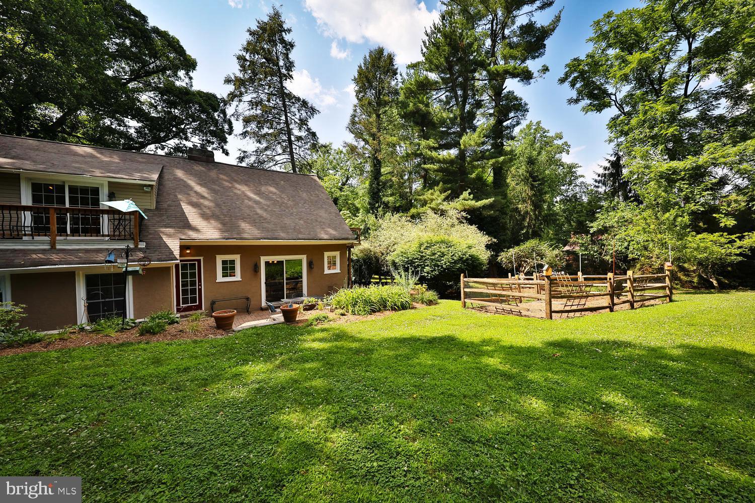 923 Rydal Road Jenkintown, PA 19046 - Photo 43 of 56 a view of a house with a yard porch and sitting area