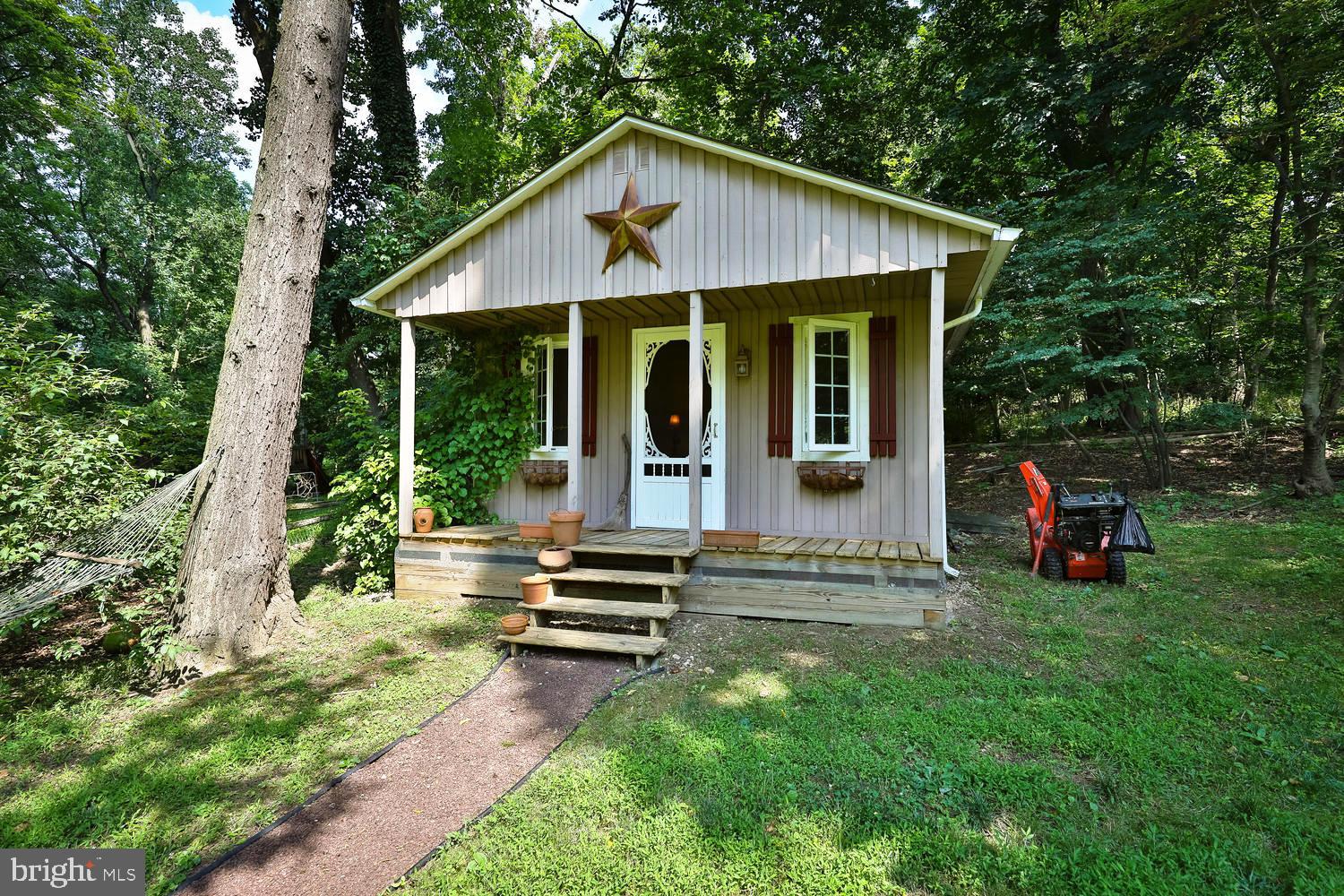 923 Rydal Road Jenkintown, PA 19046 - Photo 50 of 56 a view of a house with backyard porch and sitting area