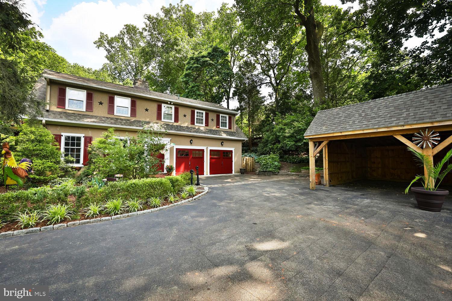 923 Rydal Road Jenkintown, PA 19046 - Photo 56 of 56 a front view of a house with garden