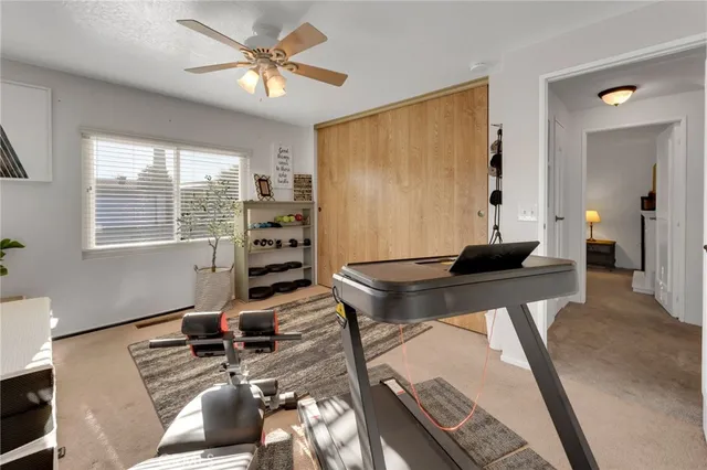 a workspace with furniture and window