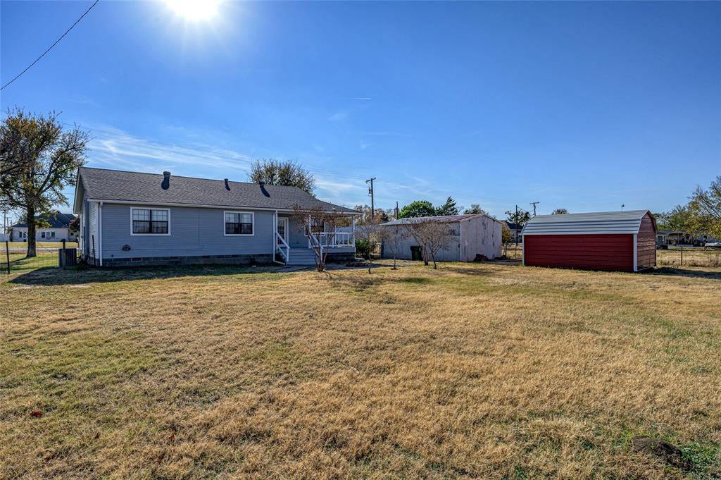208 West Maple Street Gunter, TX 75058 - Photo 28 of 32 a house view with a tub