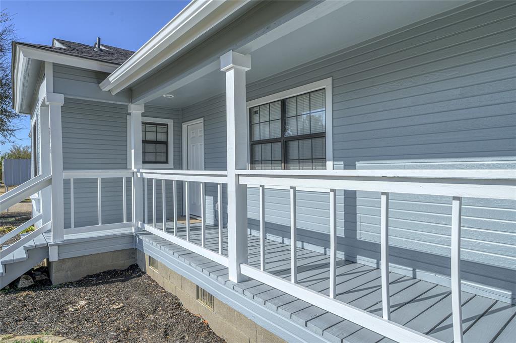 208 West Maple Street Gunter, TX 75058 - Photo 4 of 32 a view of a balcony with window