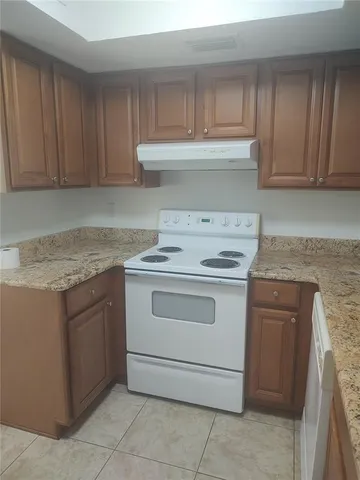 a bathroom with a shower and closet