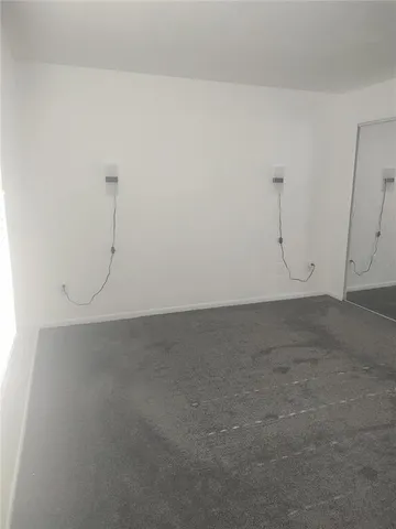 a view of a room with windows