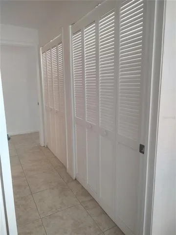 a bathroom with a white bath tub and a shower