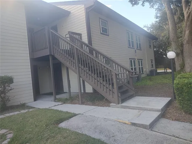 a view of an ocean and a mountain