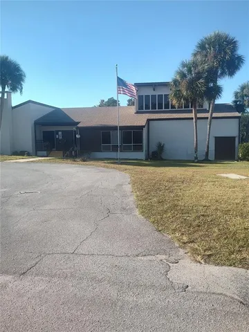 a view of outdoor space with sign board
