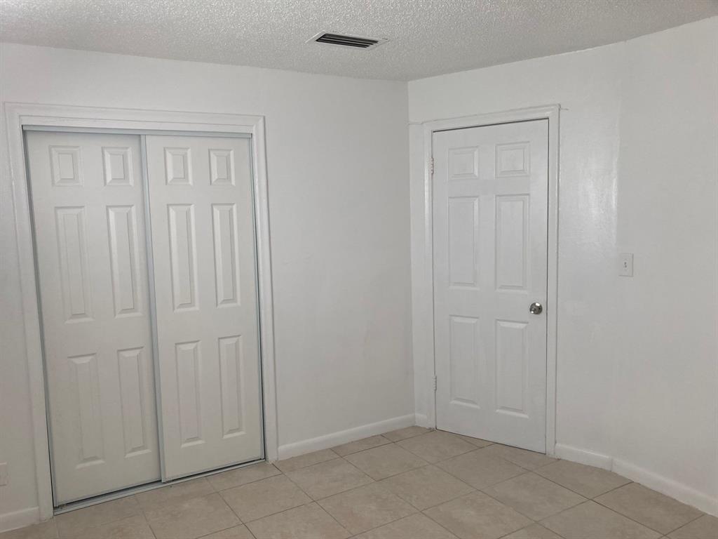 3600 Riverside Drive, Unit B Coral Springs, FL 33065 - Photo 3 of 9 a view of an empty room