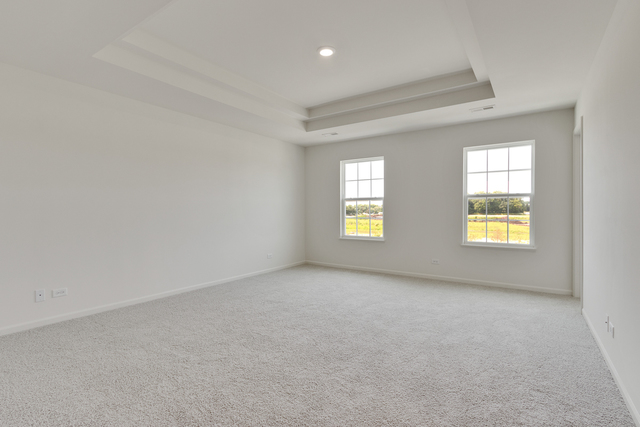 1990 Stuttle Road Batavia, IL 60510 - Photo 15 of 25 an empty room with windows and mirror