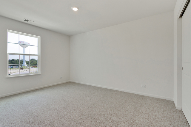 1990 Stuttle Road Batavia, IL 60510 - Photo 21 of 25 an empty room with a window