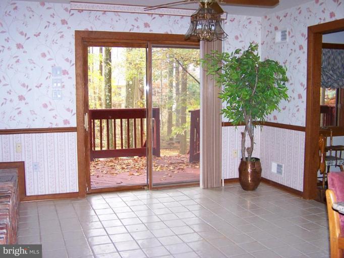10 Redgate Court Silver Spring, MD 20905 - Photo 3 of 30 a view of an entryway with a garden