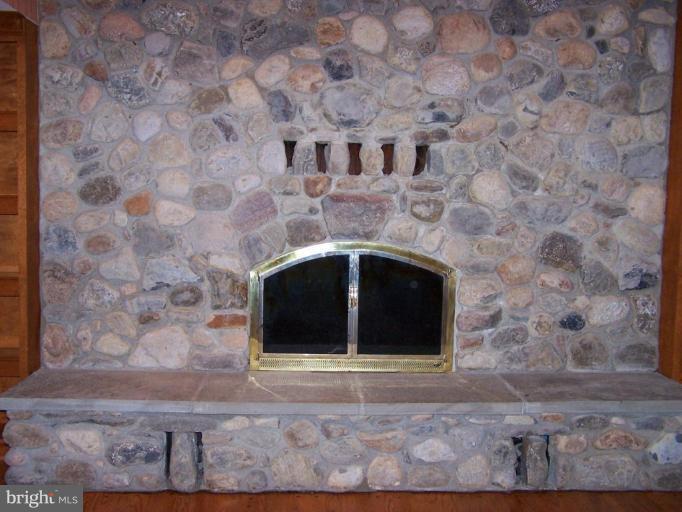 10 Redgate Court Silver Spring, MD 20905 - Photo 23 of 30 a stone fireplace