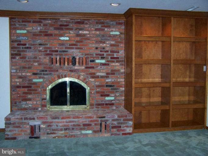 10 Redgate Court Silver Spring, MD 20905 - Photo 25 of 30 a room with fireplace