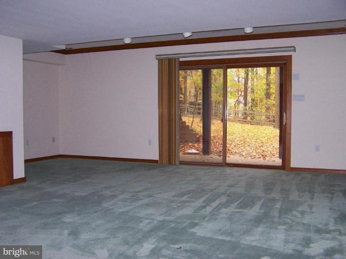 10 Redgate Court Silver Spring, MD 20905 - Photo 27 of 30 a view of an empty room with a window