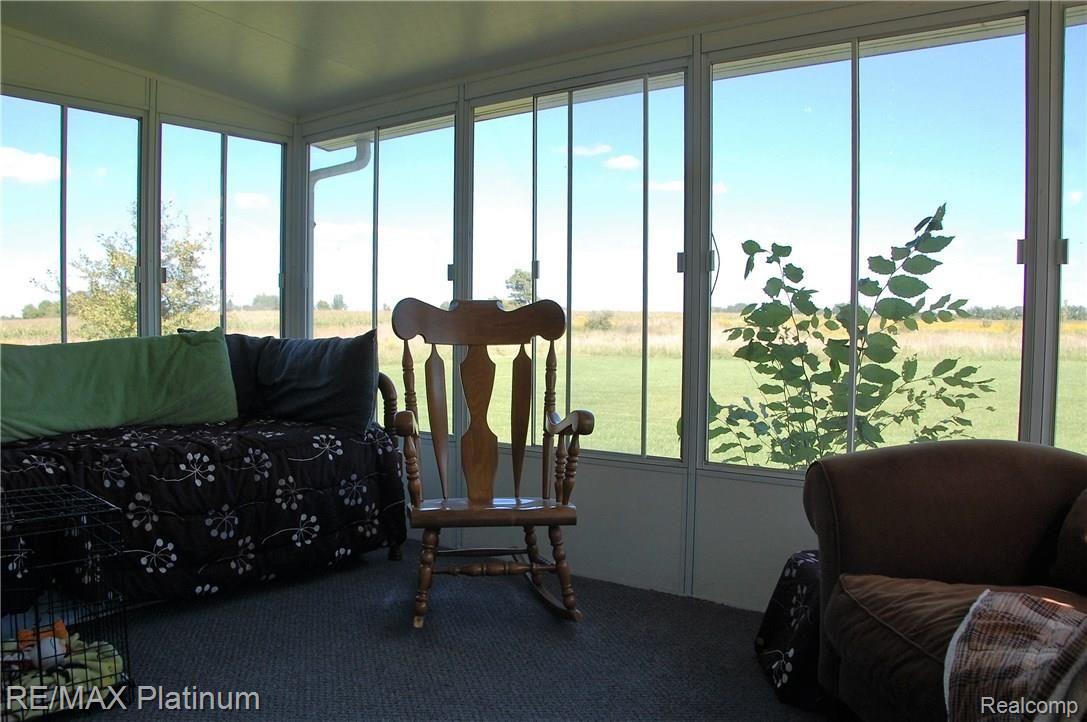 9208 North Nicholson Road Fowlerville, MI 48836 - Photo 13 of 24 Sun Room to enjoy your morning coffee or nightcap.