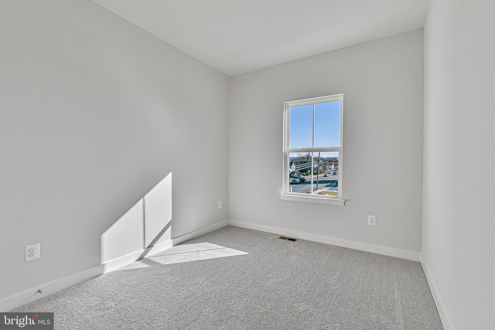 9 Oasis Avenue Ranson, WV 25438 - Photo 26 of 39 a view of an empty room with a window