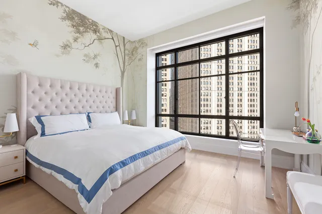 a kitchen with stainless steel appliances granite countertop a stove a sink cabinets and a refrigerator