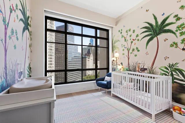 a bathroom with a sink double vanity and a mirror