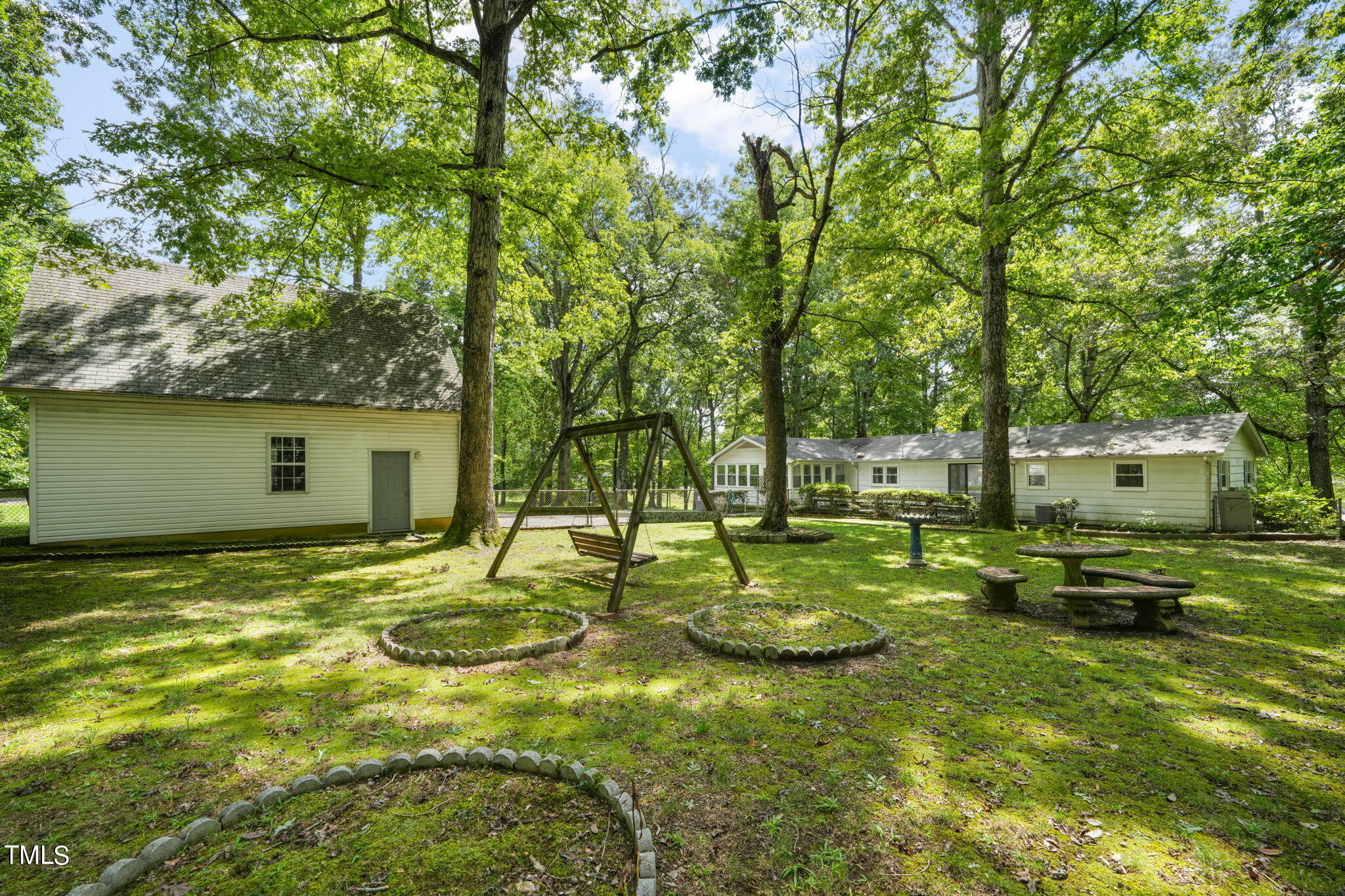 3015 Old Raleigh Road Apex, NC 27502 - Photo 30 of 47 a view of a park with swings and slides