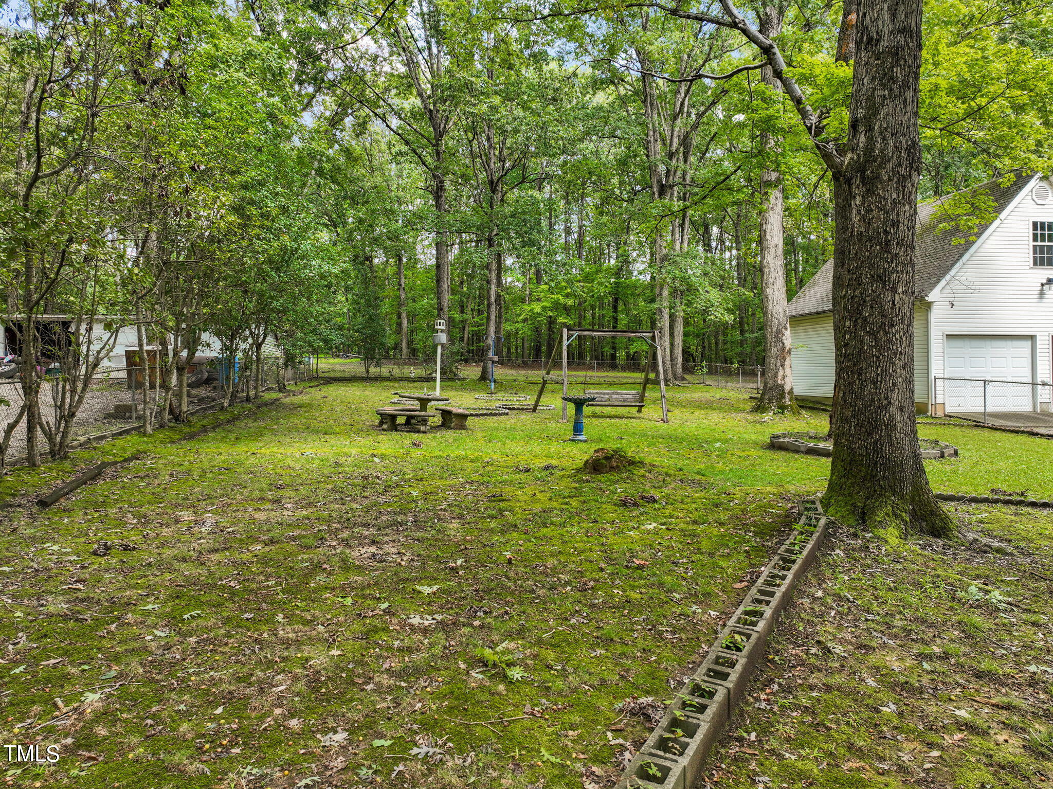 3015 Old Raleigh Road Apex, NC 27502 - Photo 31 of 47 a view of a tree in a yard